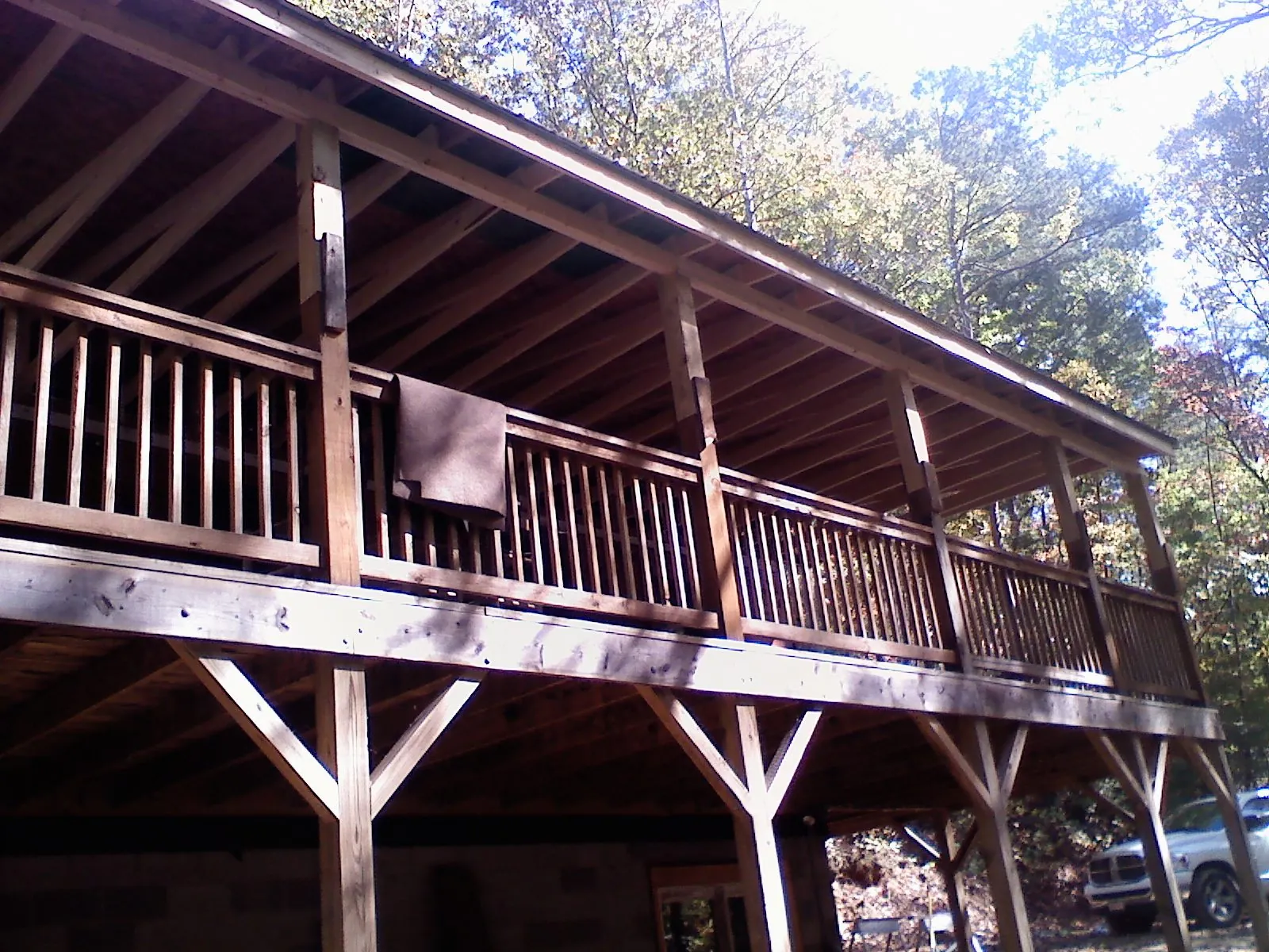 Timber framing under a new elevated porch and deck — Roof Leak Repair in Rock Stream by Roofing Brothers
